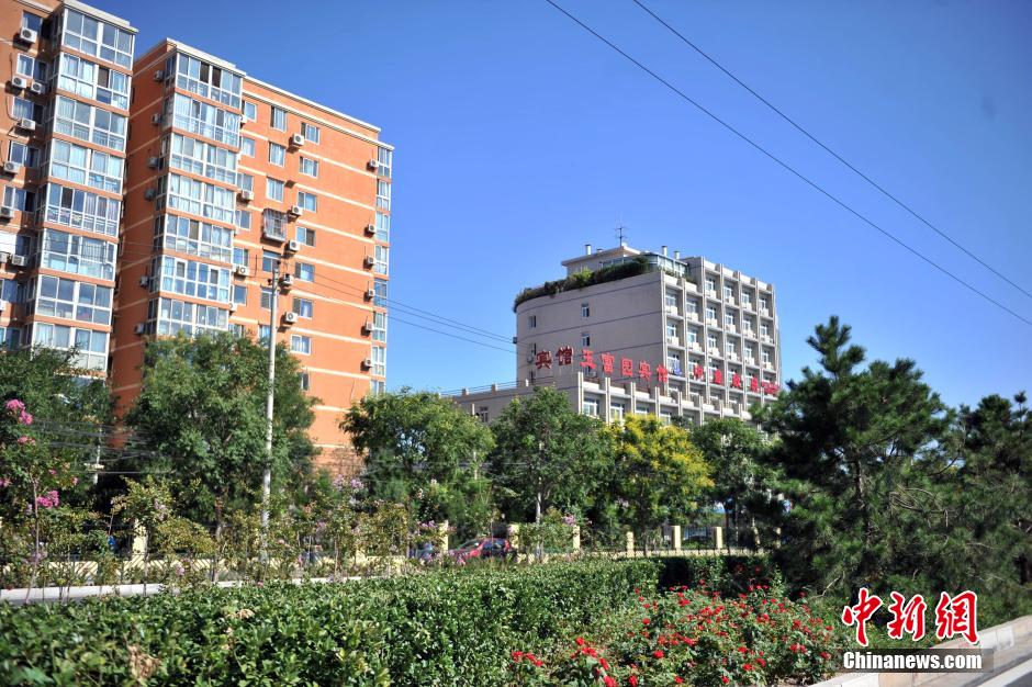 北京一大厦楼顶建“空中花园” 或被执行强拆【5】