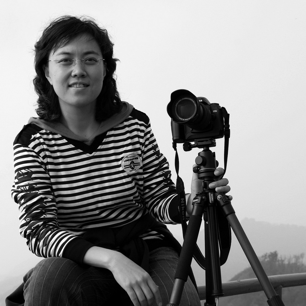 会员风采：中国女摄影家吴丹�F