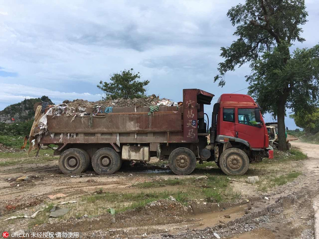 上海4000吨垃圾偷倒苏州太湖西山岛 现场垃圾