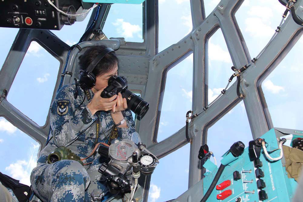 2014��3��14�գ�������Ѱ����ʧ���ɻ����й��վ������ƺ���ɷá�