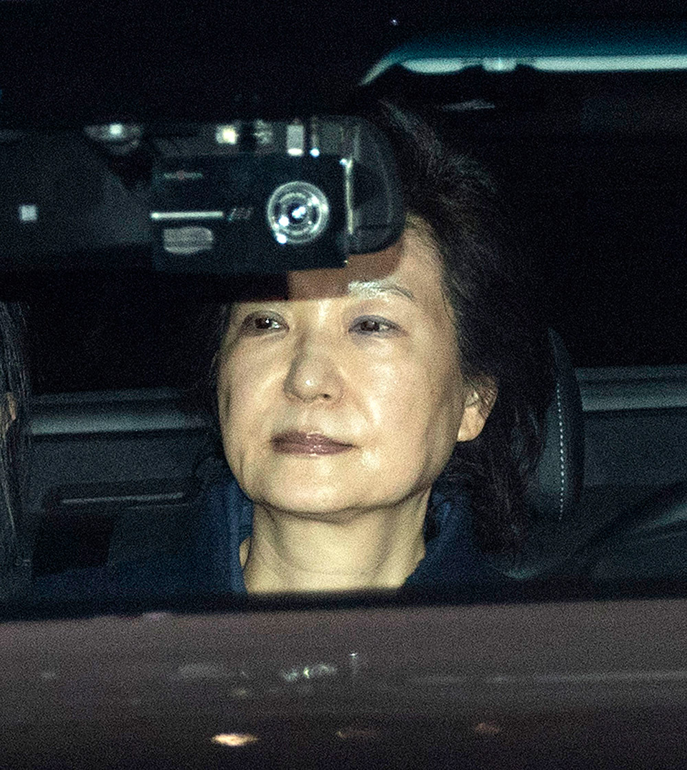 3月31日，韓國前總統朴槿惠從首爾中央地方檢察廳被移送至首爾看守所。新華社發