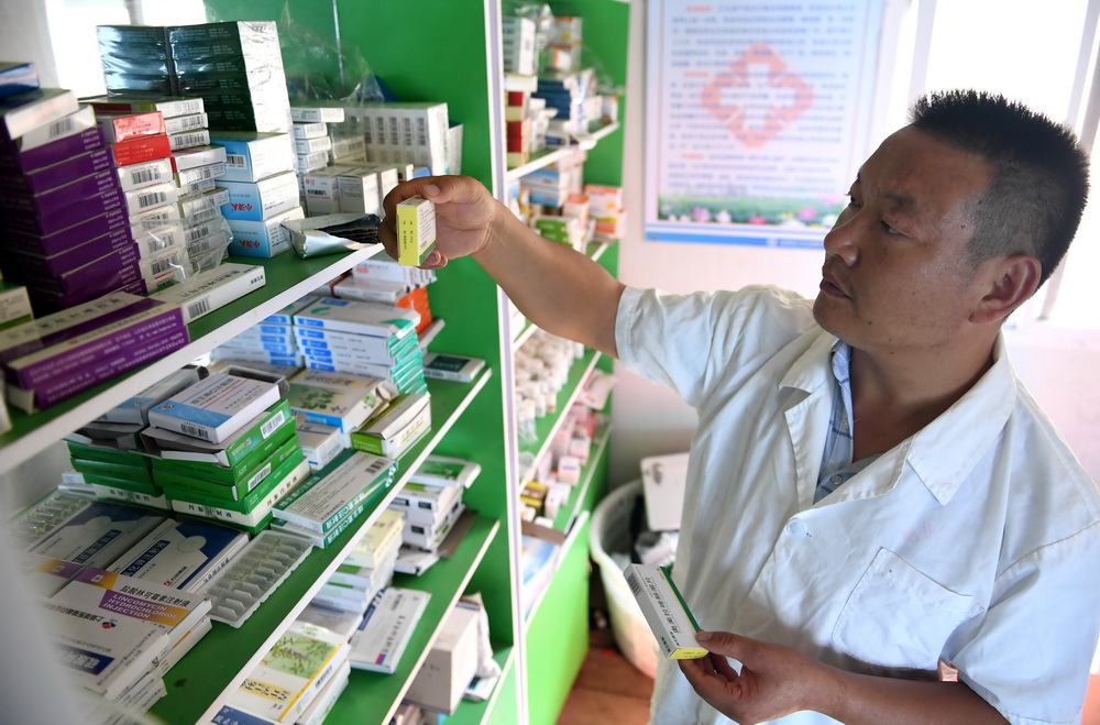 9��14�գ���Ҿ�������վΪ����ȡҩ�� �»����������ϲ��