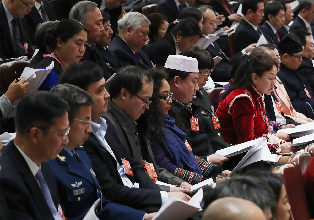 第十三屆全國人民代表大會第一次會議在北京人民大會堂開幕。這是全國政協委員列席大會。新華社記者 王曄 攝