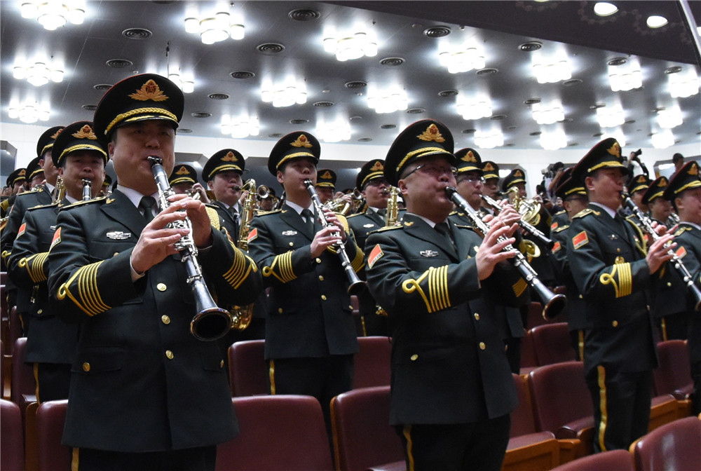 第十三屆全國人民代表大會第一次會議在北京人民大會堂開幕。這是軍樂團在演奏。新華社記者 饒愛民 攝