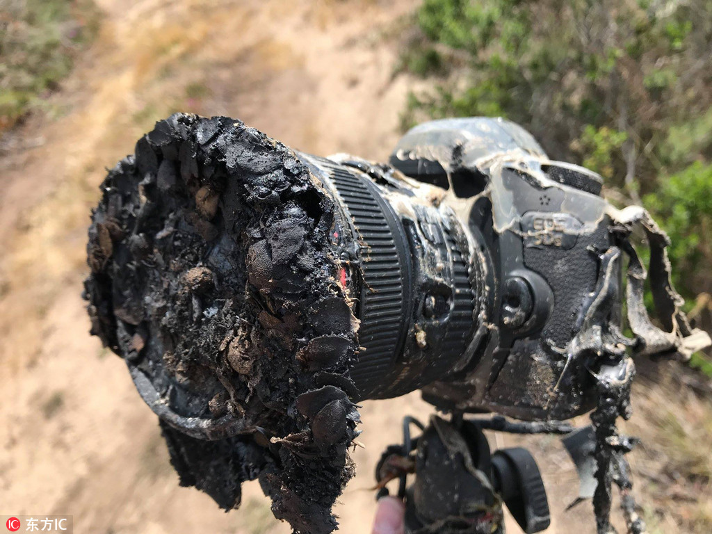 NASA攝影師拍攝火箭升空 單反被烤焦近乎“毀容”