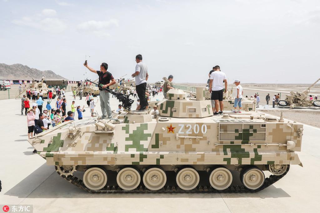 新疆库尔勒：国际军事比赛开幕 各地军迷现场观赛热情高(6) 第6页