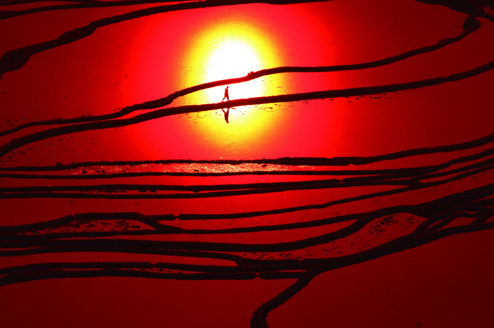 哈尼人水田中的太陽，元陽哀牢山，2010 年 李子青攝
