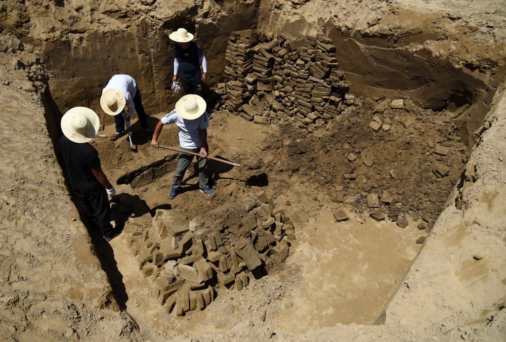 這是6月14日拍攝的山東小清河章丘段考古發掘現場。
