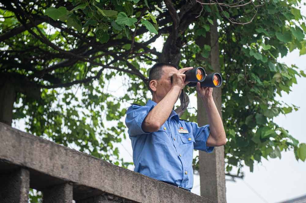 5��7�գ�ͯ����ʹ����Զ���۲�����ˮλ��