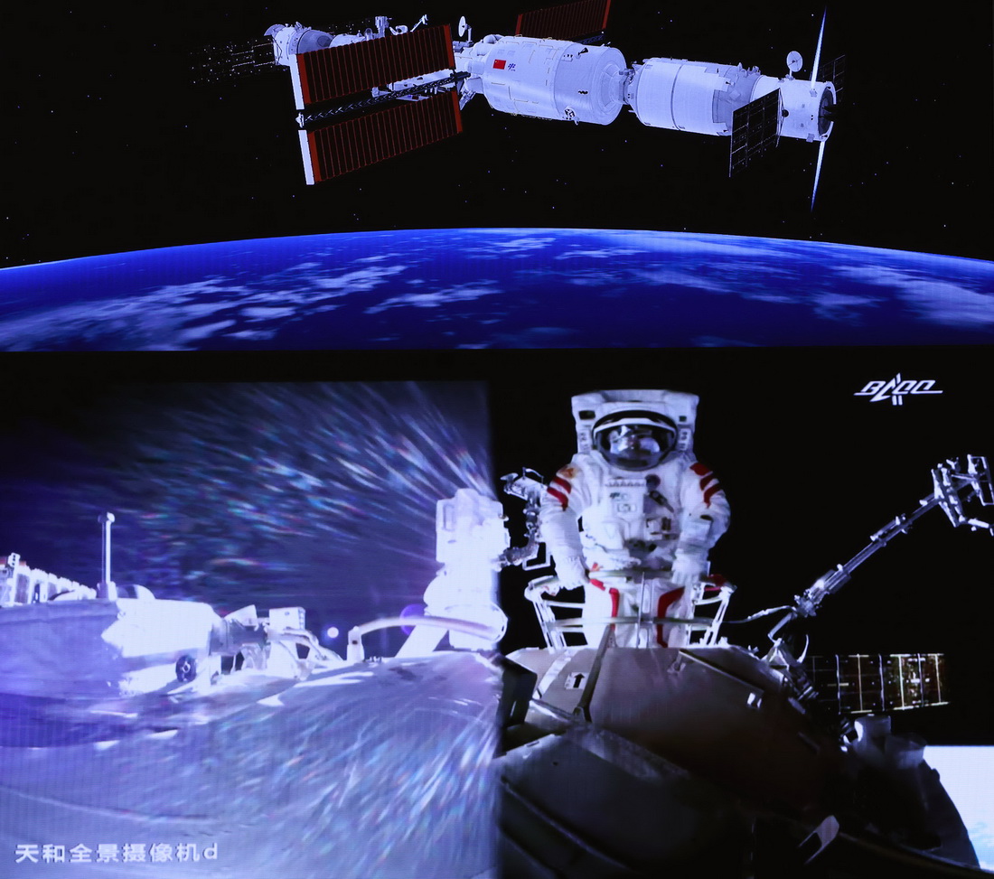 7月4日，在北京航天飛行控制中心大屏拍攝的航天員劉伯明在艙外工作場面。