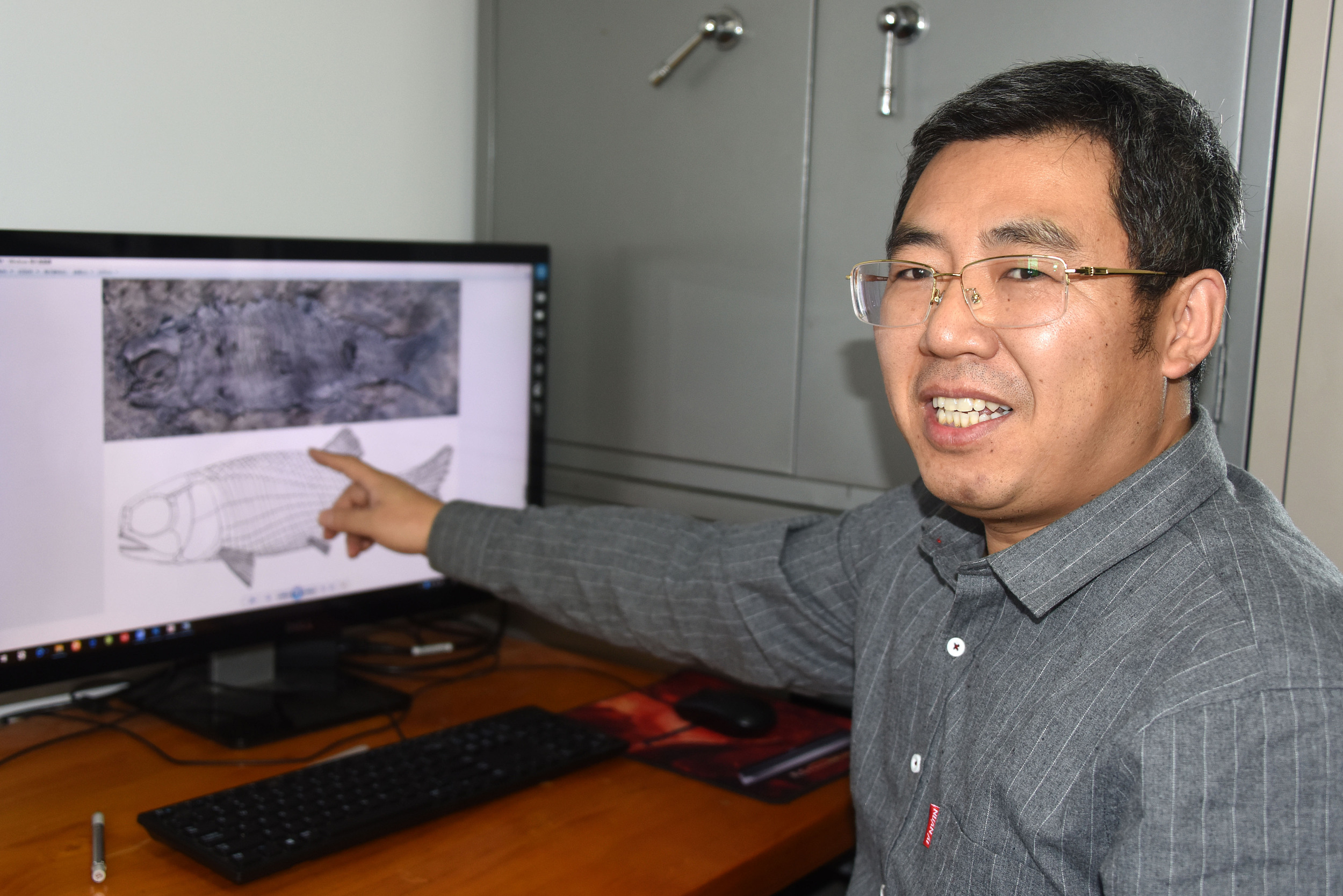 10月26日，徐光輝研究員當天下午在北京辦公室接受中新社記者採訪，介紹亞洲肋鱗裂齒魚化石研究最新成果。