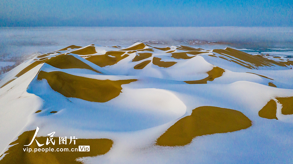 新疆塔克拉瑪干沙漠迎來罕見強降雪【9】