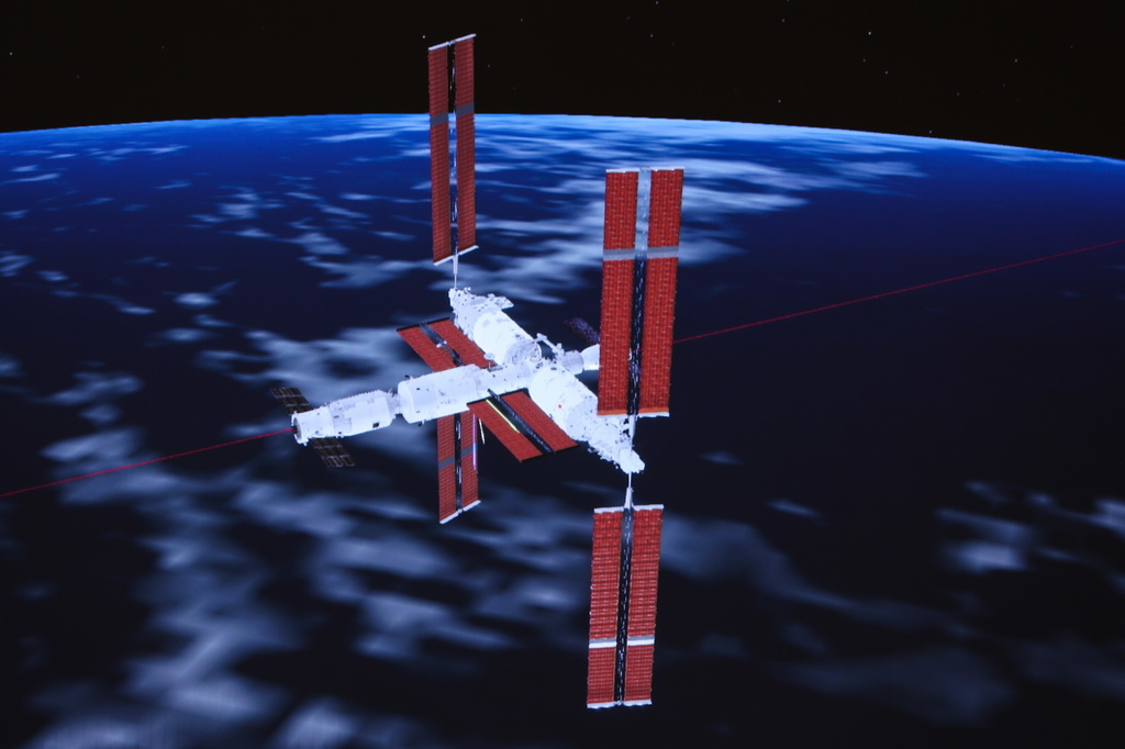 1月18日在北京航天飞行控制中心拍摄的天舟七号货运飞船与空间站组合体完成交会对接的模拟图像。新华社发（韩启扬 摄）