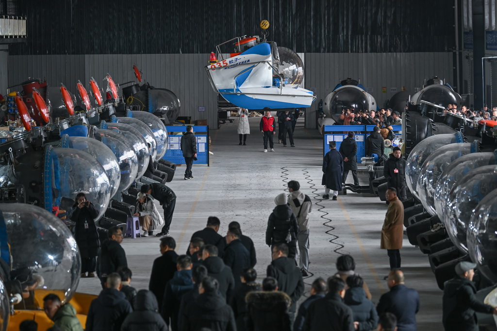 1月20日，重慶坤聯機械制造有限公司生產廠房內，前來參觀的人絡繹不絕。