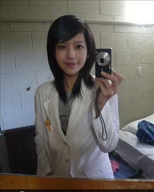 组图:台湾最美兽医就是她 (6)