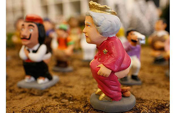 西班牙推出奥巴马伍兹等政客名人拉大便玩偶