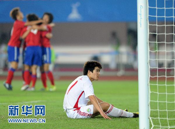中国男足0比3负于韩国队遭淘汰